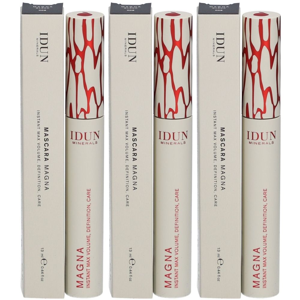 Meerdere mascara tubes en verpakkingen. De verpakking is crèmekleurig met een rood patroon. IDUN MINERALS en MAGNA staan op de tube.