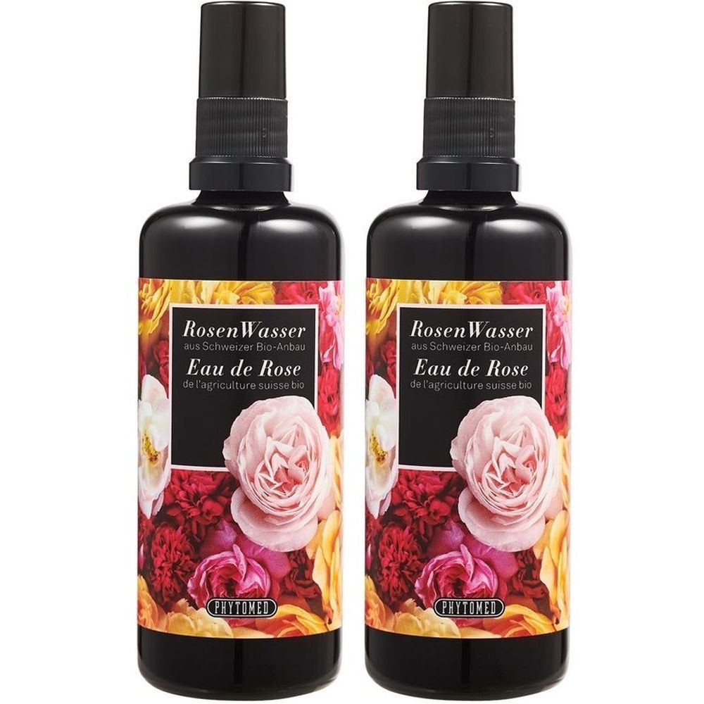 Deux flacons de Rosenwasser avec vaporisateur noir. Étiquette avec motif de roses et inscription 'Eau de Rose'.
