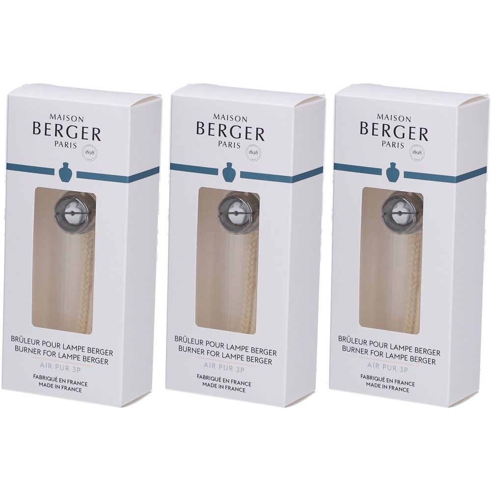 Trois boîtes blanches. Inscription: MAISON BERGER PARIS, brûleur pour Lampe Berger. Fenêtre avec brûleur visible.