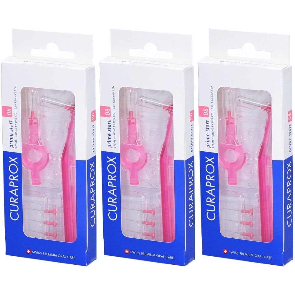 Trois boîtes de brosses interdentaires CURAPROX. Chaque boîte contient une brosse rose et des recharges. Inscription : prime start 08.