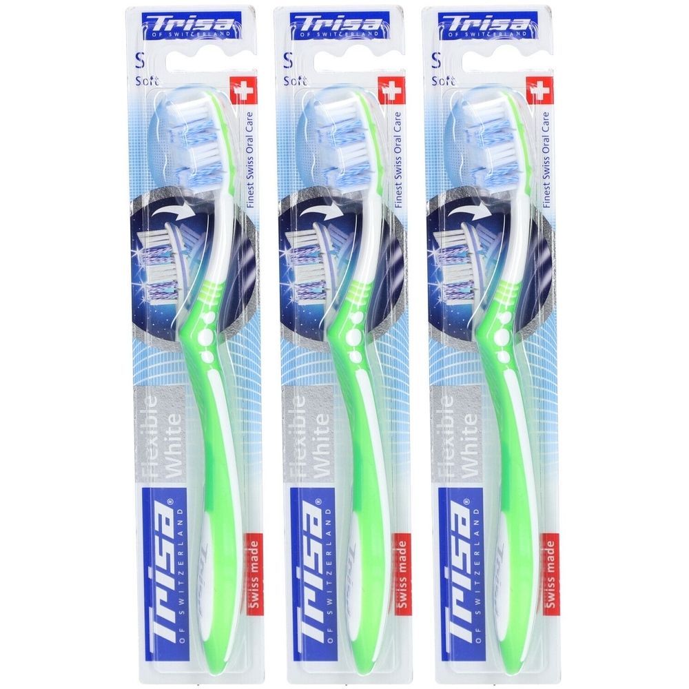 Trois brosses à dents emballées. Manches verts, poils blancs. Marque : Trisa. Inscription : Flexible White, Swiss made.