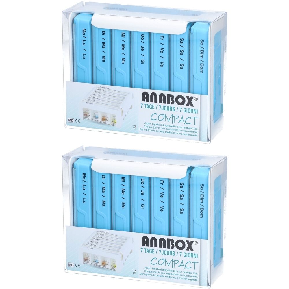 Deux piluliers bleus à sept compartiments, étiquetés avec les jours de la semaine. Emballés dans des boîtes en plastique transparentes. Marque : Anabox Compact.