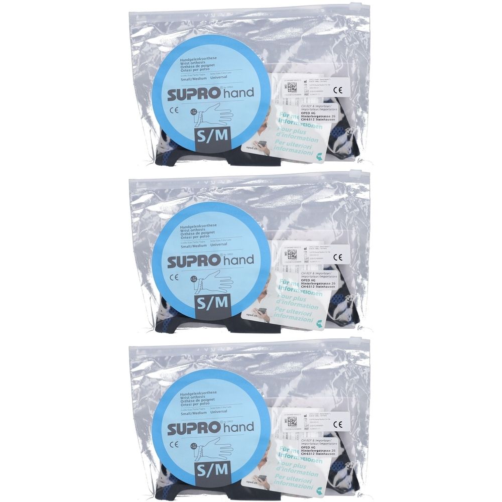 Trois attelles de poignet OPED® SUPROhand en emballage plastique. Cercles bleus avec "SUPRO hand" et taille S/M. Marquage CE.