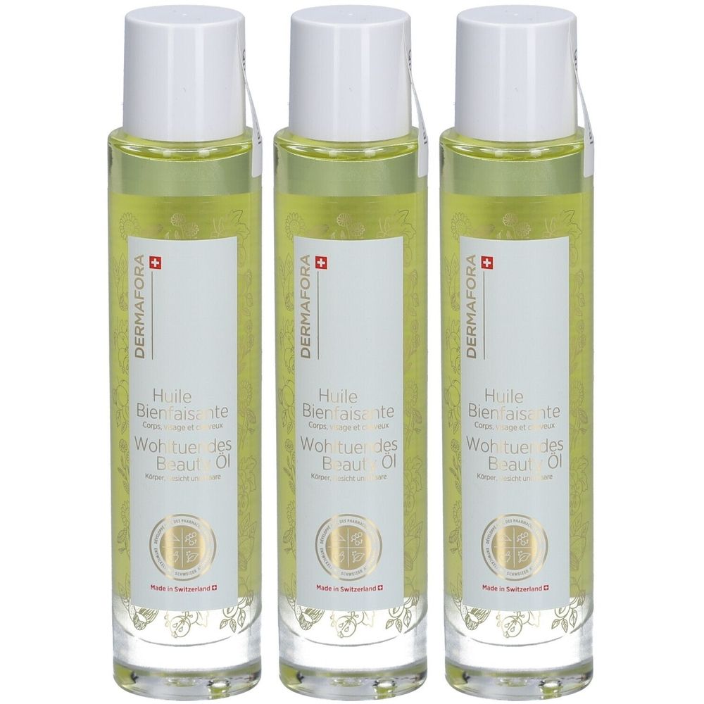 Drie flessen Dermafora® Body Oil. Transparante glazen flessen met witte dop en etiket. Zwitsers kruis en productnaam zichtbaar.