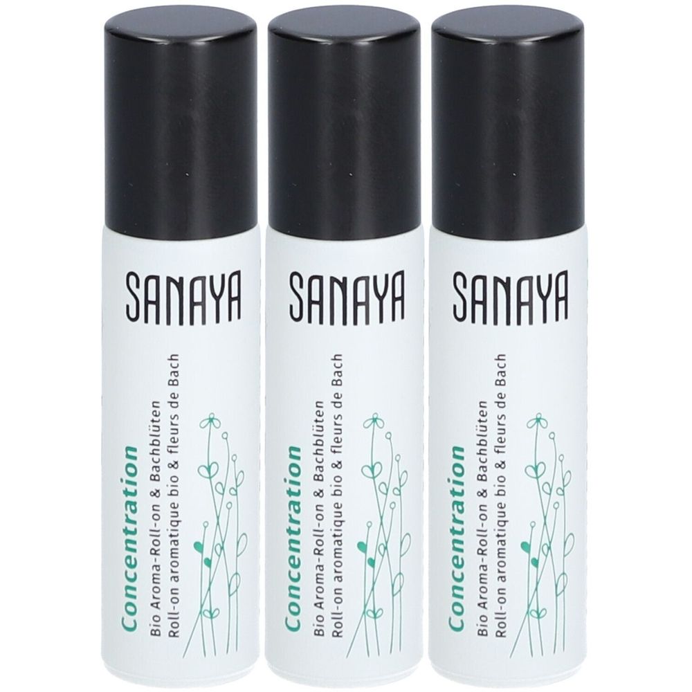 Trois flacons roll-on avec bouchons noirs. Inscription SANAYA, Concentration, Bio Aroma-Roll-on & Bachblüten. Flacons blancs avec motif floral.