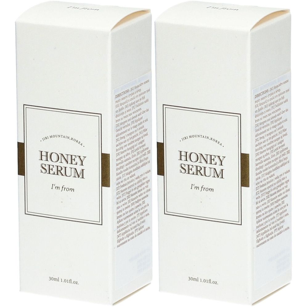Twee witte dozen met de tekst HONEY SERUM, I'm from. Opschrift: 30ml 1.01fl.oz. Bruine accenten.
