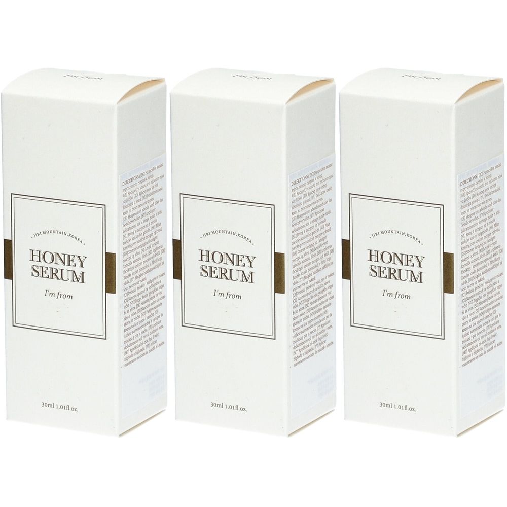 Trois boîtes blanches. Chaque boîte porte, dans un cadre rectangulaire, l'inscription "HONEY SERUM" et "I'm from".