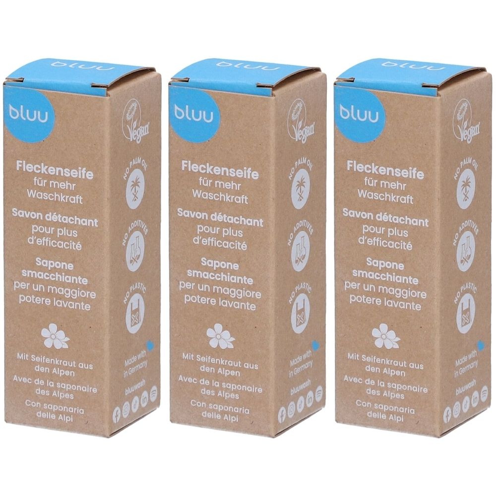 Trois boîtes rectangulaires avec informations produit. Inscription: BLUU Fleckenseife. Label végan. Emballage marron, couvercle bleu.