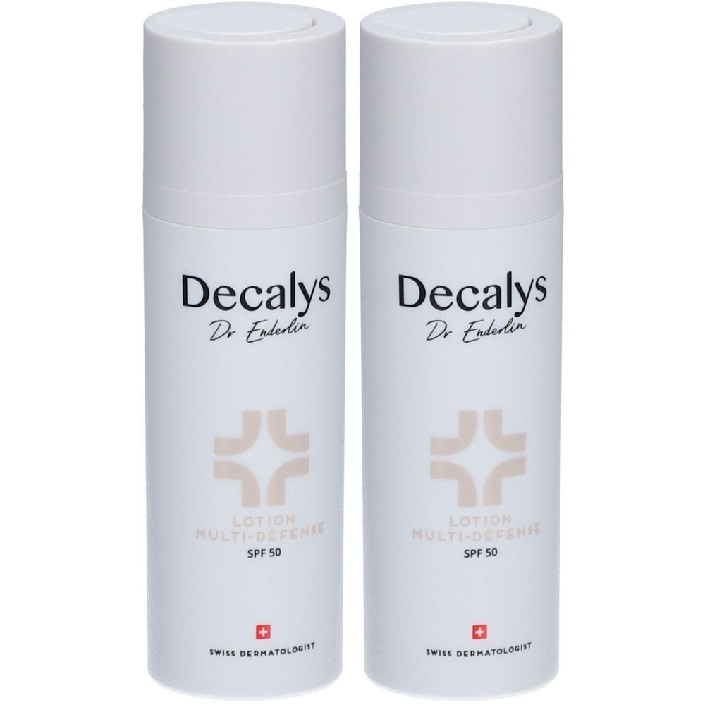 Twee witte lotionflessen. Opschrift: Decalys, Dr. Enderlin, Lotion Multi-Défense SPF 50. Zwitserse dermatoloog.