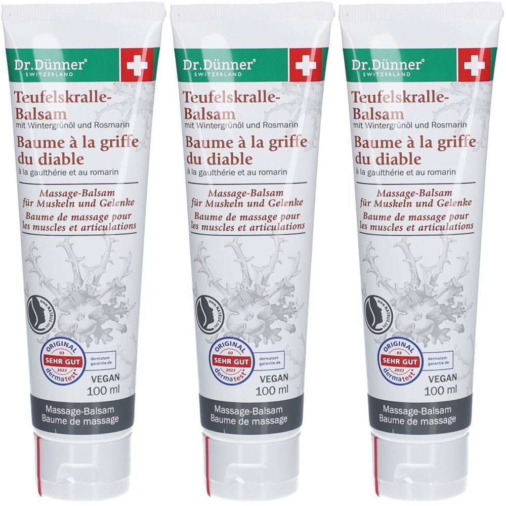 Trois tubes de Baume. Blanc, texte rouge et vert. Croix suisse. Texte: Teufelskralle-Balsam, Baume de massage, Vegan, 100 ml.