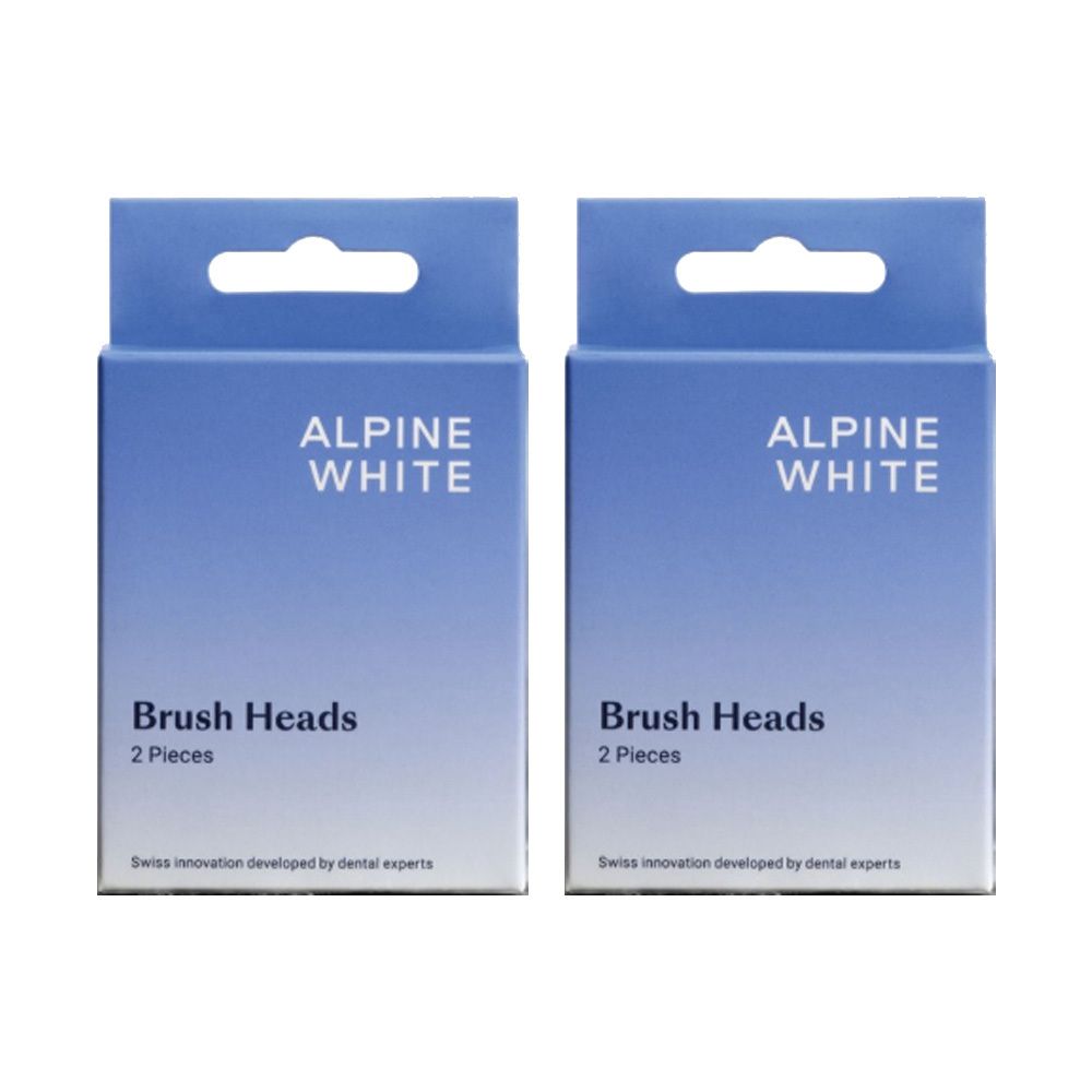 Twee blauwe dozen met "ALPINE WHITE" en "Brush Heads". Elke doos bevat "2 Pieces". Zwitserse innovatie.