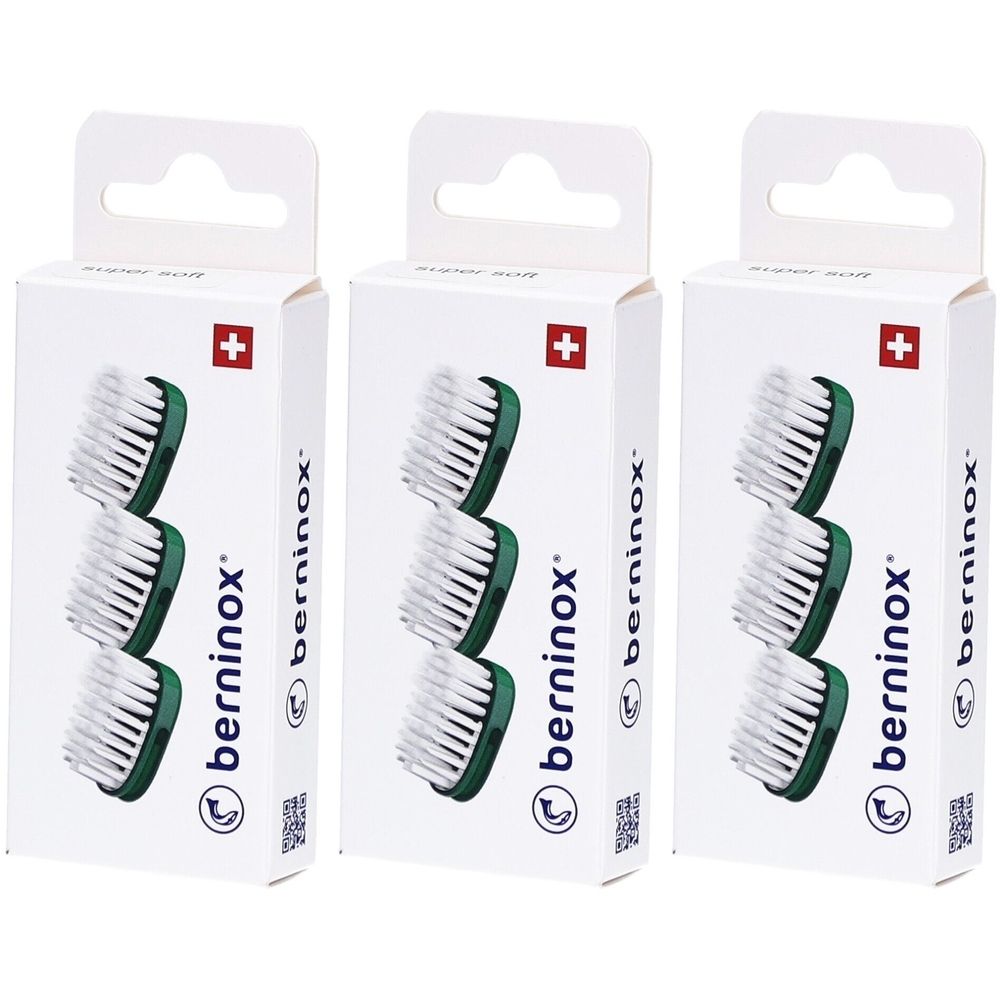Trois boîtes de têtes de brosse de remplacement. Chaque boîte contient trois têtes de brosse à poils blancs et supports verts. Marque : berninox.
