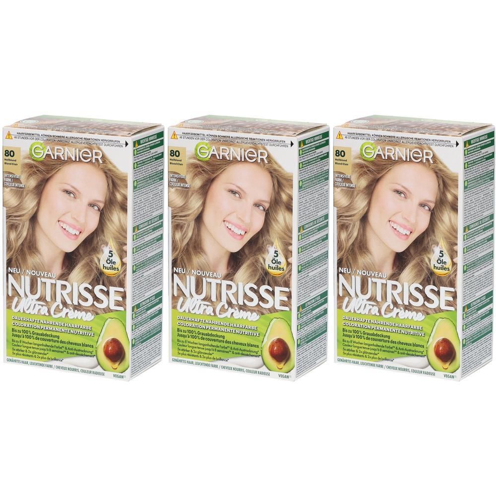 Trois boîtes Garnier Nutrisse Ultra Crème 80 Blond clair. Impression : femme blonde, avocat, nom du produit.
