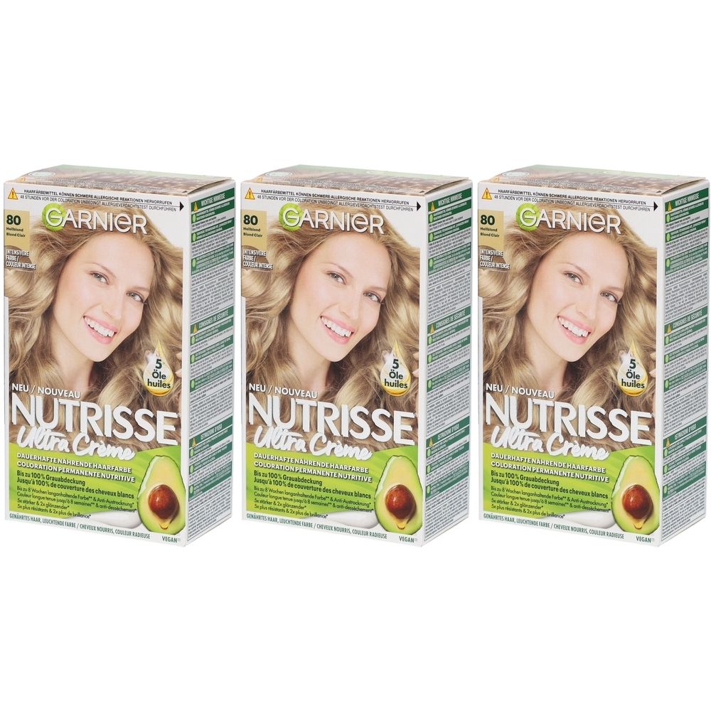 Trois boîtes Garnier Nutrisse Ultra Crème 80 Blond clair. Impression : femme blonde, avocat, nom du produit.