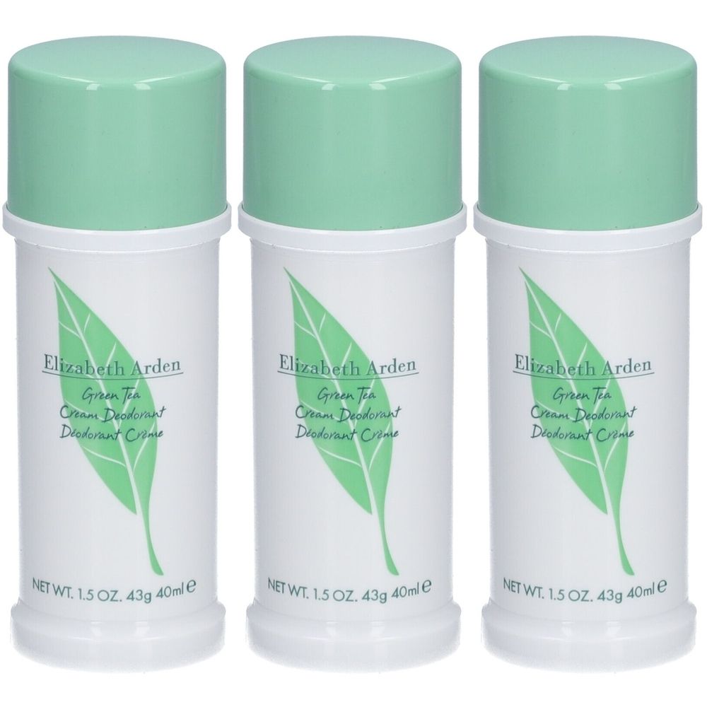 Trois crèmes déodorantes avec couvercles verts. Inscription : Elizabeth Arden Green Tea Cream Deodorant. Récipients cylindriques blancs avec motif de feuille.