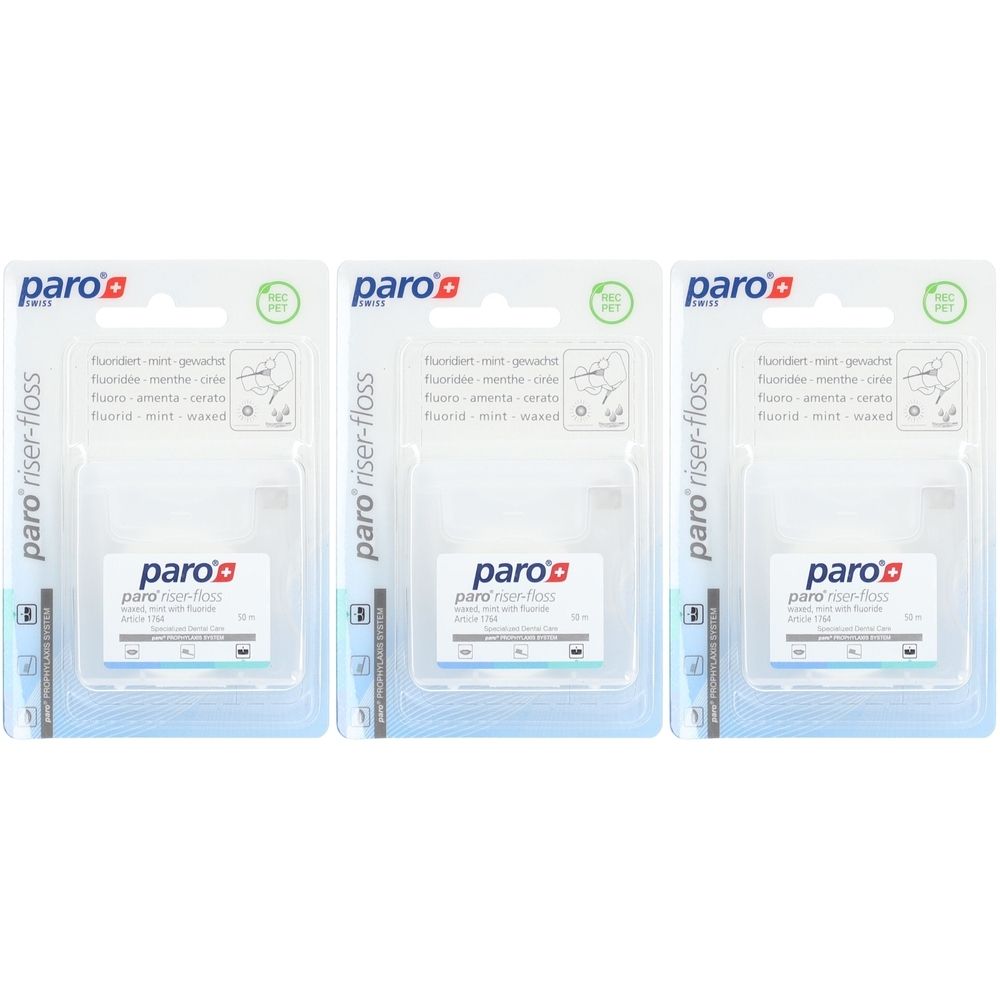 Drie verpakkingen paro riser-floss tandzijde. Elke verpakking bevat een transparante doos met een wit etiket en het paro-logo. De verpakking is wit en transparant.