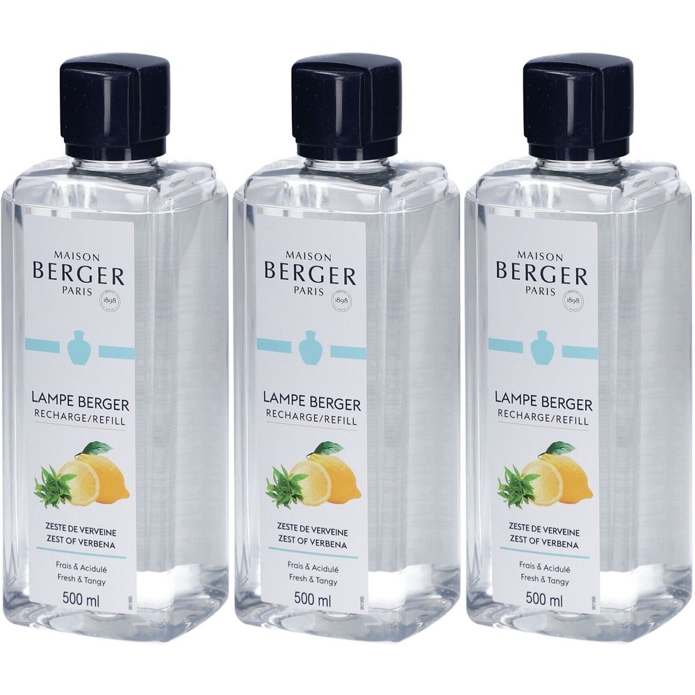 Trois flacons de recharge Lampe Berger. Liquide clair, bouchon noir. Étiquette avec logo, nom du produit et indication de contenu.