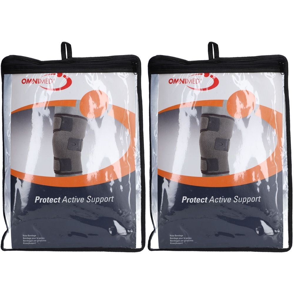 Deux genouillères OMNIMED Protect dans leurs housses de protection. Genouillères grises avec fermetures velcro.