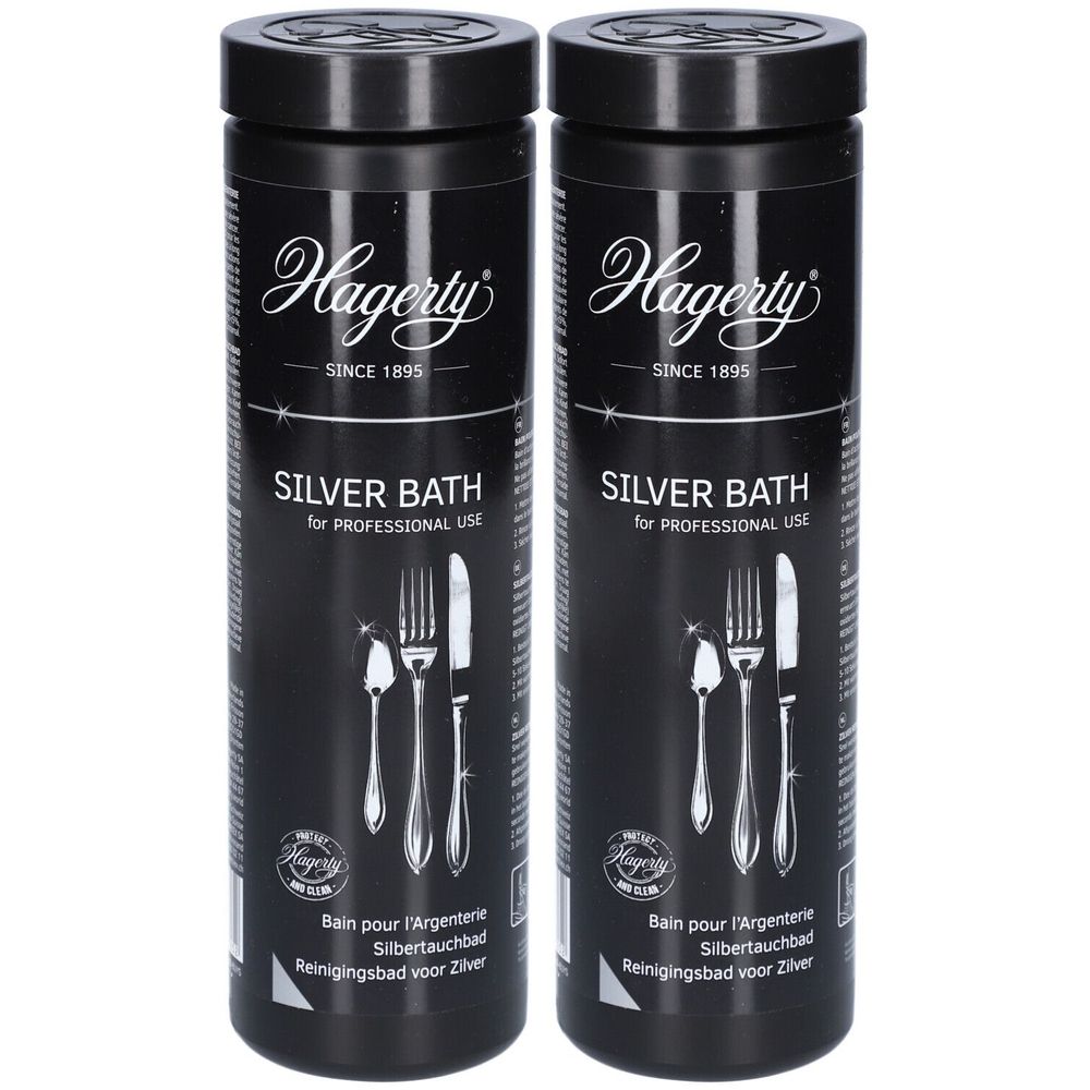 Twee zwarte cilindrische containers met deksels. Opschrift: Hagerty Silver Bath. Illustratie van bestek. Tekst in het Frans, Duits en Nederlands.