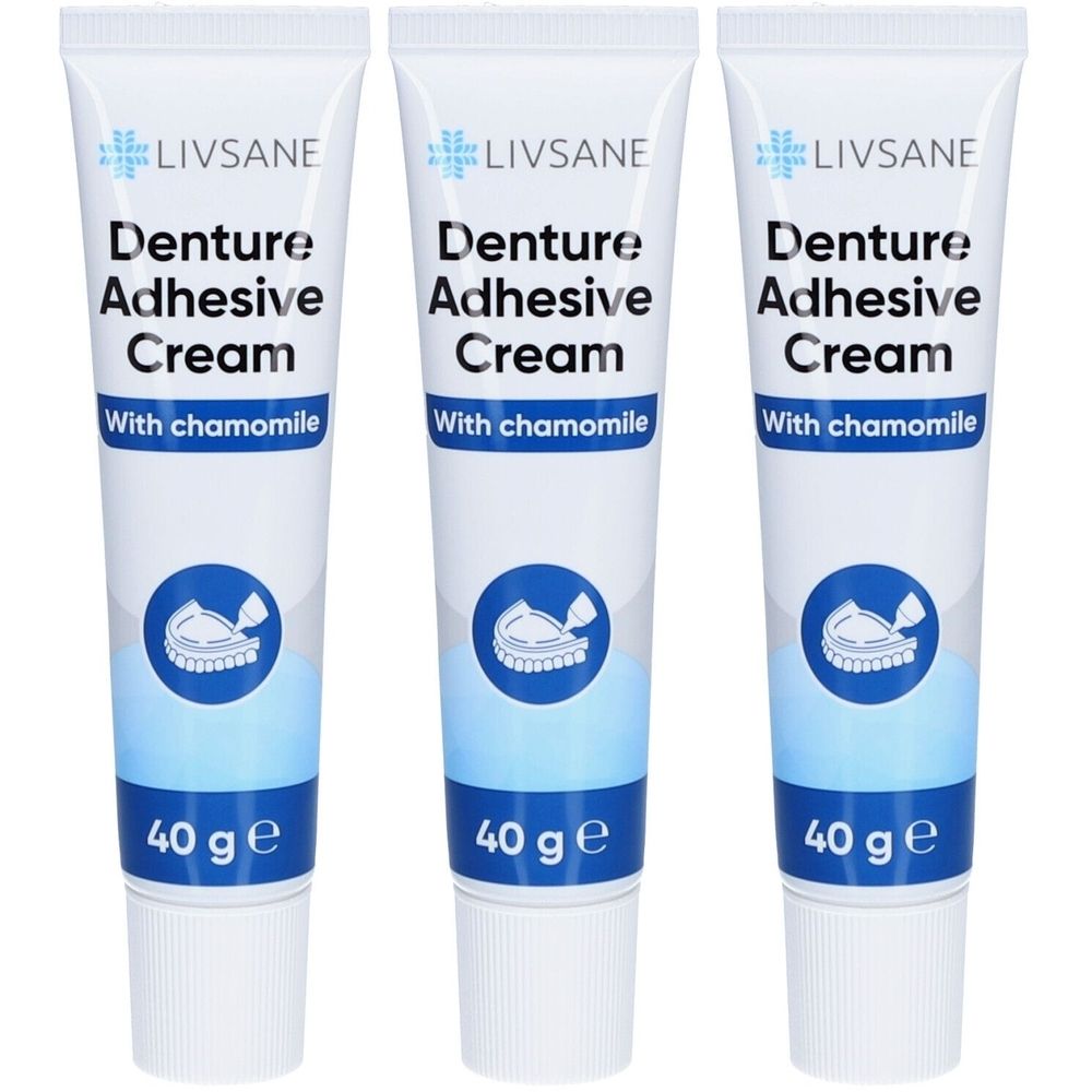 Trois tubes de crème adhésive. Inscription: LIVSANE, Denture Adhesive Cream, With chamomile. En bas: 40 g e. Design bleu et blanc avec symbole dentaire.