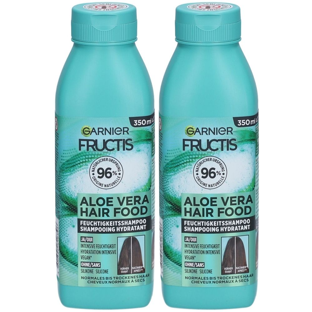 Twee shampoo flessen. Turquoise flessen met blauwe dop. Opschrift: Garnier Fructis Aloe Vera Hair Food. 350ml.