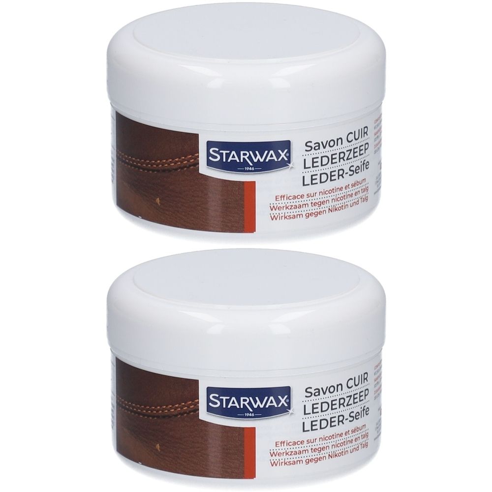 Twee witte potten met deksels. Bruin etiket met STARWAX-logo en productnaam. Tekst: Savon CUIR, LEDERZEEP, LEDER-Seife. Efficace sur nicotine.