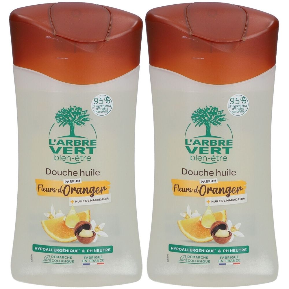 Deux flacons de douche huile. Inscription: L'ARBRE VERT, Douche huile, Fleurs d'Oranger. Avec certifications et 95% d'ingrédients d'origine naturelle.