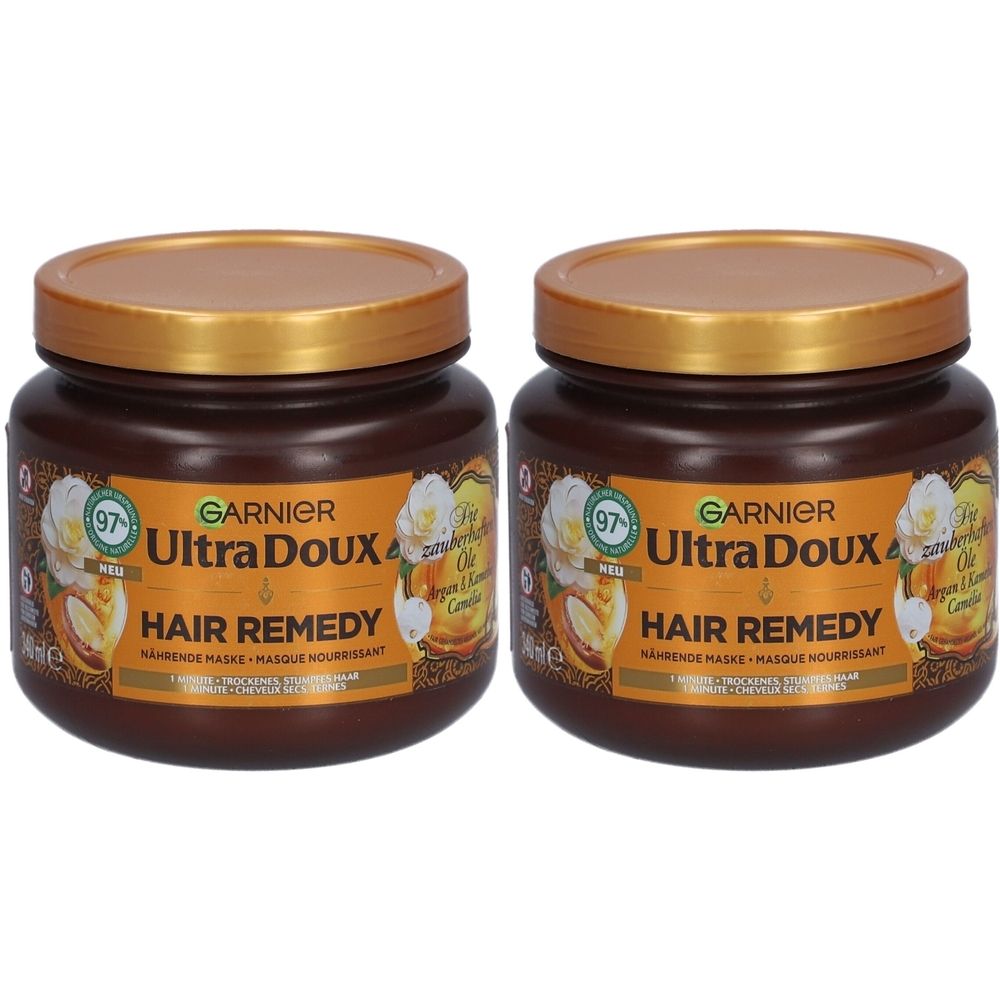 Twee potten Garnier Ultra Doux Hair Remedy masker met arganolie en cameliaolie.