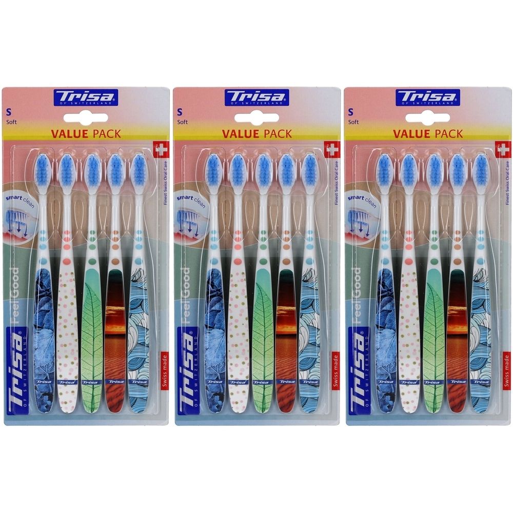 Paquet de brosses à dents. Plusieurs brosses à dents avec des poils bleus et des manches colorés. Marque : Trisa. Emballage avec l'inscription "VALUE PACK".