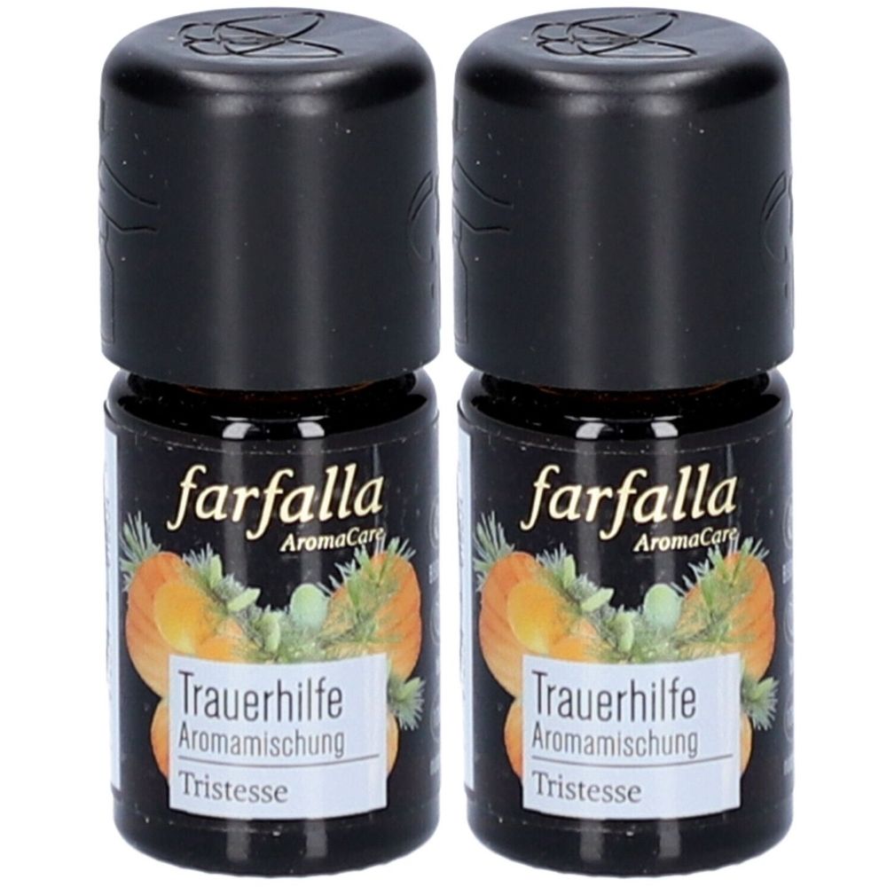 Twee kleine glazen flesjes met zwarte dop. De etiketten tonen "farfalla AromaCare" en "Trauerhilfe Aromamischung". 