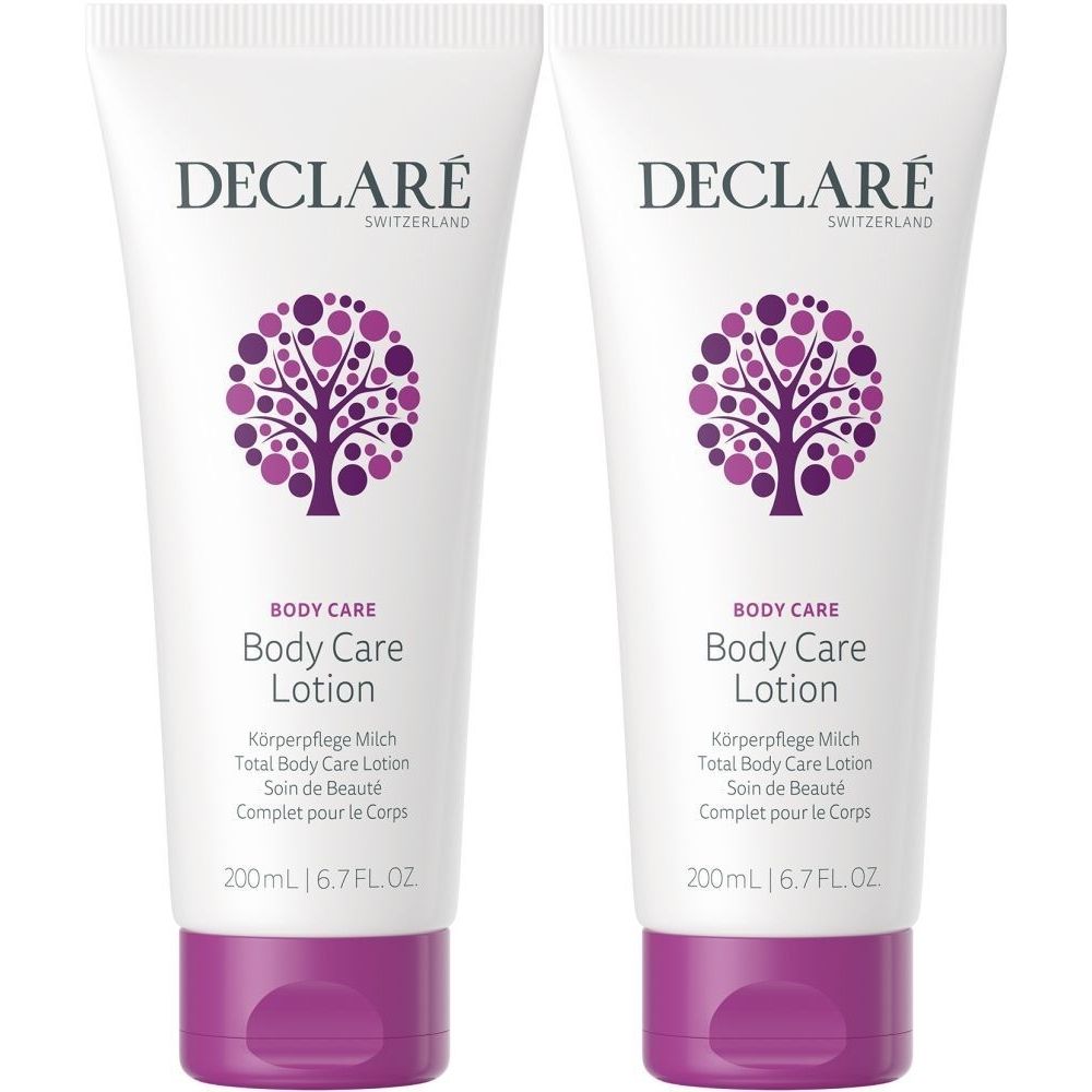 Twee tubes DECLARÉ Body Care Lotion. Wit, met paarse accenten en logo. Tekst: Body Care Lotion, 200ml.