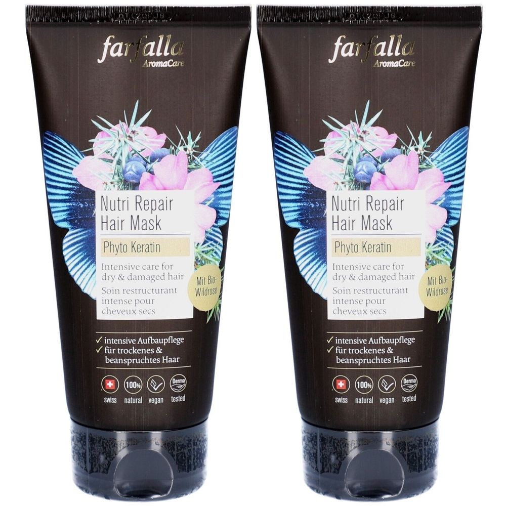 Deux tubes de masque capillaire. Inscription: Nutri Repair Hair Mask, Phyto Keratin. Motif floral et logo. Bouchon noir.