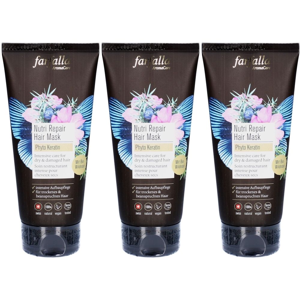 Trois tubes de Farfalla Nutri Repair Hair Mask. Tubes noirs avec motif floral et informations produit. Sceau de qualité suisse.