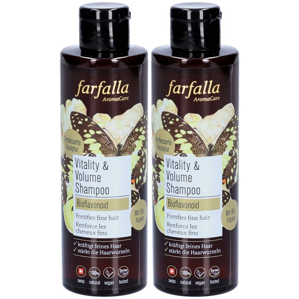 Twee flessen Farfalla Vitality & Volume Shampoo. Bruine flessen met zwarte dop. Opschrift: Vitality & Volume Shampoo, Bioflavonoid.