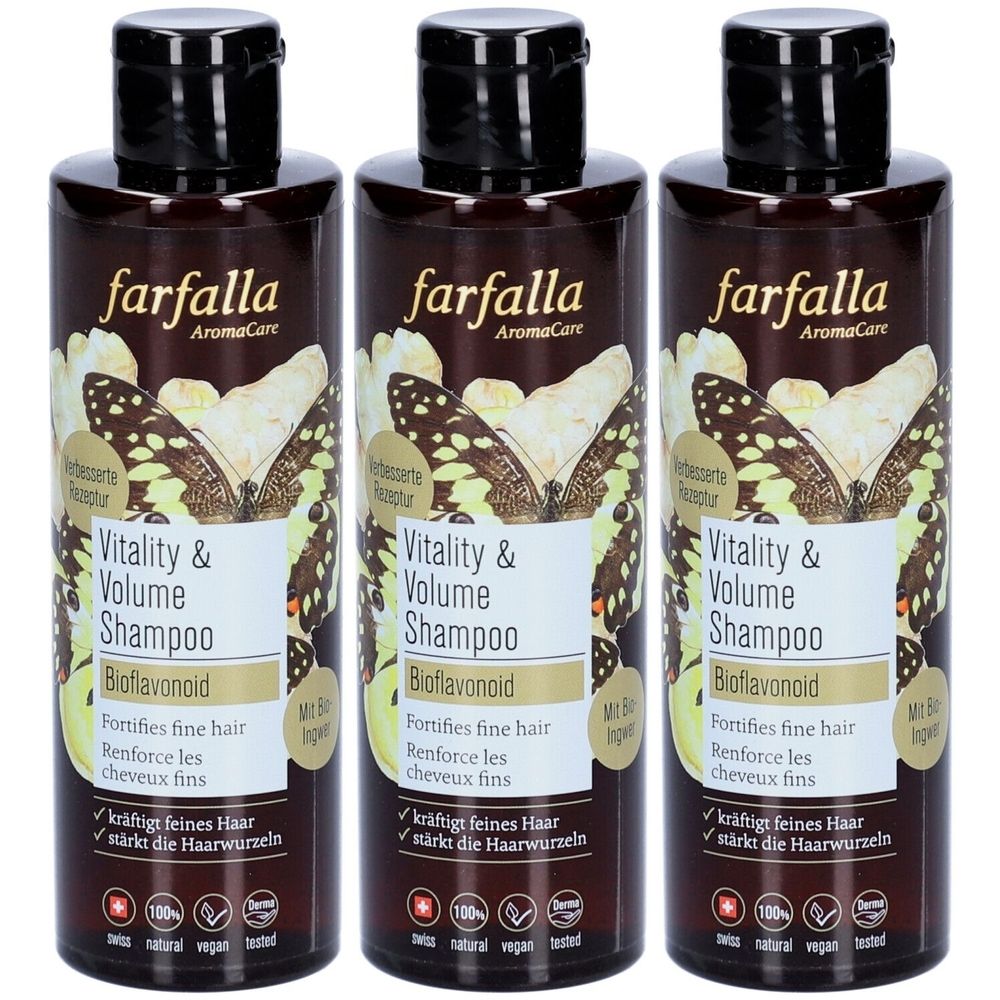 Trois flacons de shampooing Farfalla Vitality & Volume. Flacons bruns avec bouchons noirs. Inscription : Vitality & Volume Shampoo, Bioflavonoid.