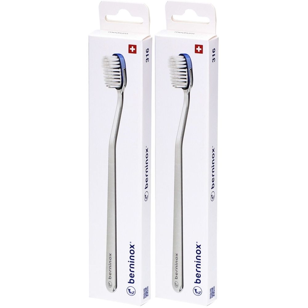 Twee tandenborstels in witte verpakkingen. De borstels hebben zilveren handvatten en blauwe borstelharen. Het Berninox-logo staat op de verpakkingen.