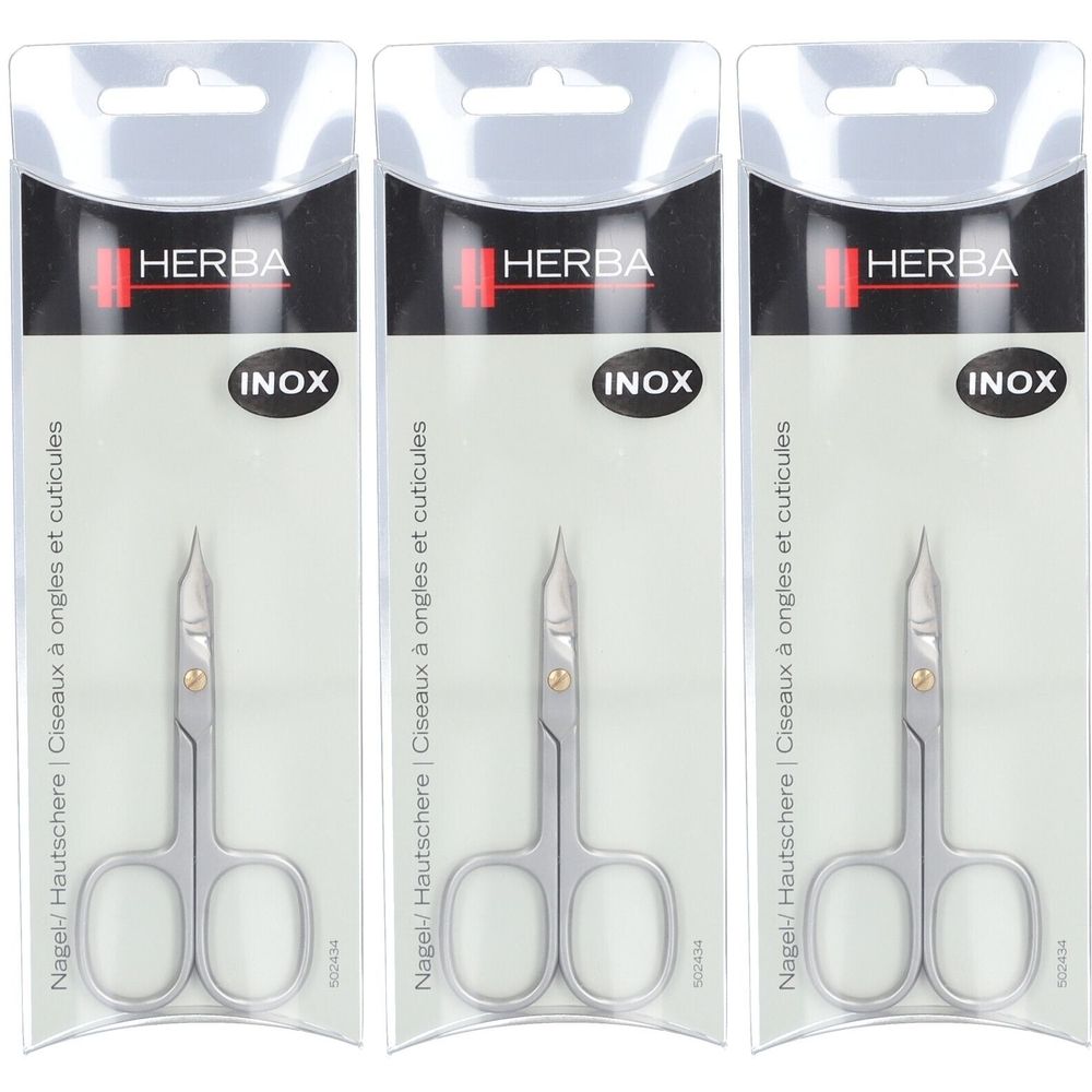 Trois ciseaux dans un emballage. Marque HERBA, INOX. Inscription : Nagel-/ Hautschere | Ciseaux à ongles et cuticules.