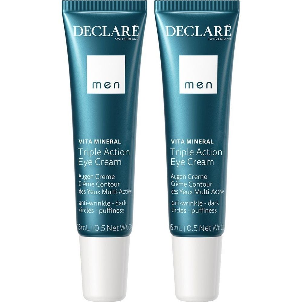 Deux tubes de crème pour les yeux. Tubes bleus avec bouchons blancs. Inscription: DECLARÉ, men, Triple Action Eye Cream.