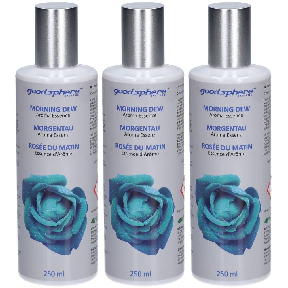 Trois flacons avec bouchons argentés. Inscription : Morning Dew Aroma Essence, Rosée du Matin. Image d'une rose bleue.