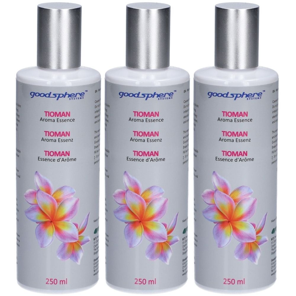 Trois flacons de TIOMAN Aroma Essence. Flacons blancs avec bouchons argentés. Impression du nom du produit et motif floral.