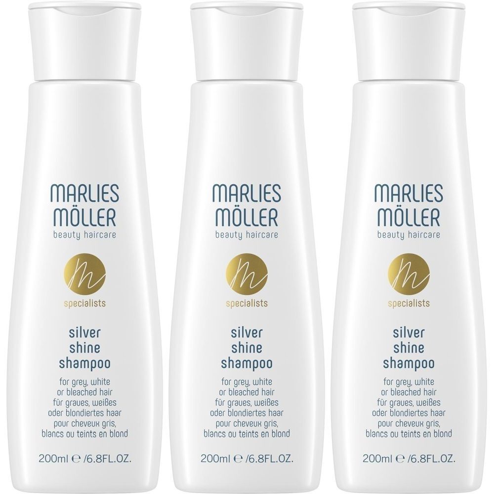 Trois flacons de shampooing blancs avec bouchon rabattable. Inscription : Marlies Möller, Silver Shine Shampoo pour cheveux gris, blancs ou blonds.