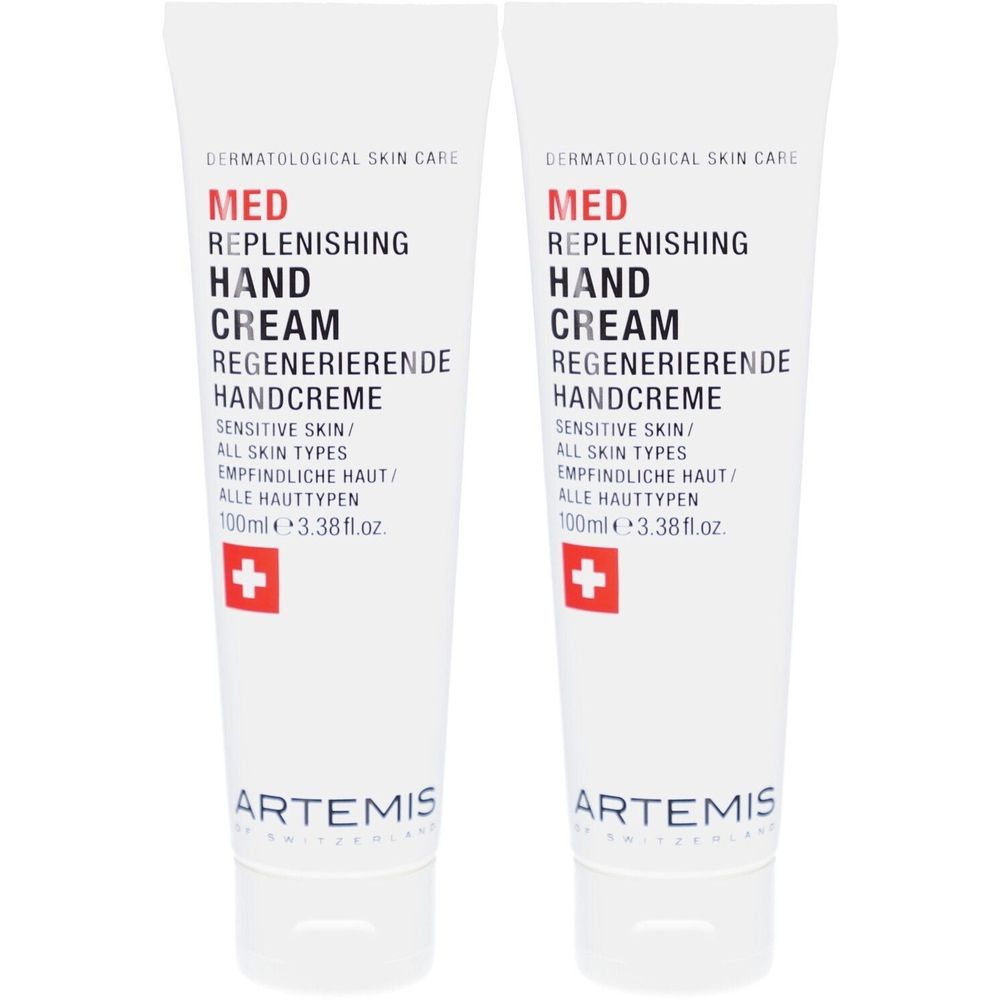 Twee witte tubes handcrème. Opschrift: MED Hand Cream, Zwitsers kruis. Merk: ARTEMIS.