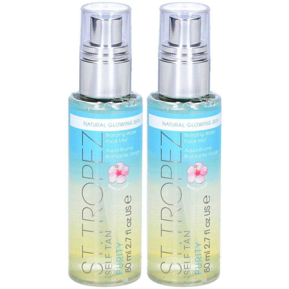 Twee flessen St. Tropez Self Tan Purity Bronzing Water Face Mist. Transparante flessen met zilveren verstuivers. Opschrift: Natural Glowing Skin.