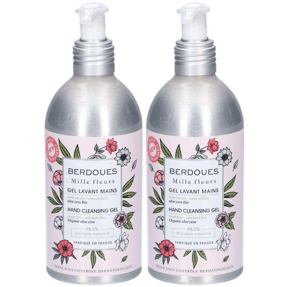 Deux flacons de gel lavant pour les mains avec étiquette florale. Pompes argentées. Inscription: Berdoues Mille fleurs, Gel Lavant Mains, Hand Cleansing Gel.