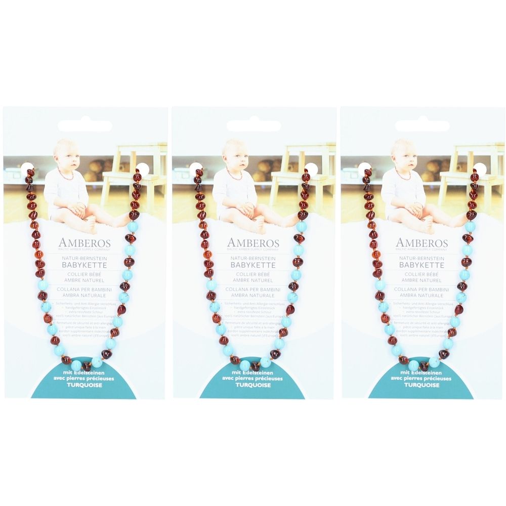 Trois colliers pour bébé avec ambre et turquoise sur emballage. Marque AMBEROS. Colliers avec perles rougeâtres et bleues.
