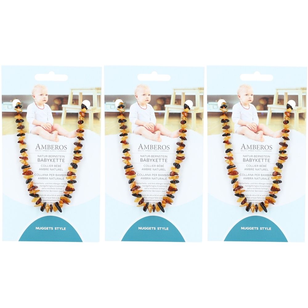 Trois colliers pour bébés en ambre naturel. Chaque collier est emballé sur une carte avec photo de bébé et logo AMBEROS.