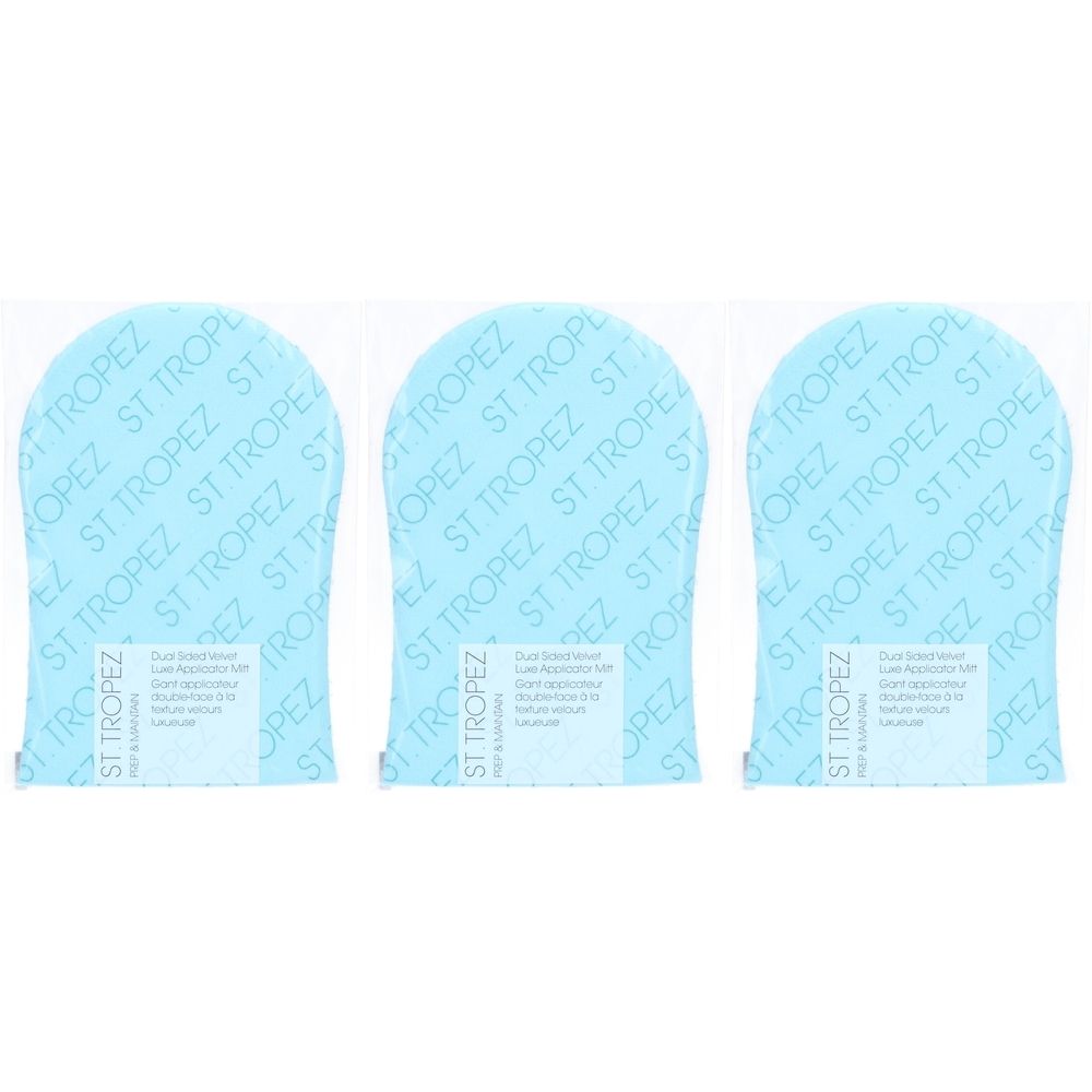 Drie blauwe applicatorhandschoenen in folieverpakking. Opdruk: ST TROPEZ. Tekstvelden met productinformatie.