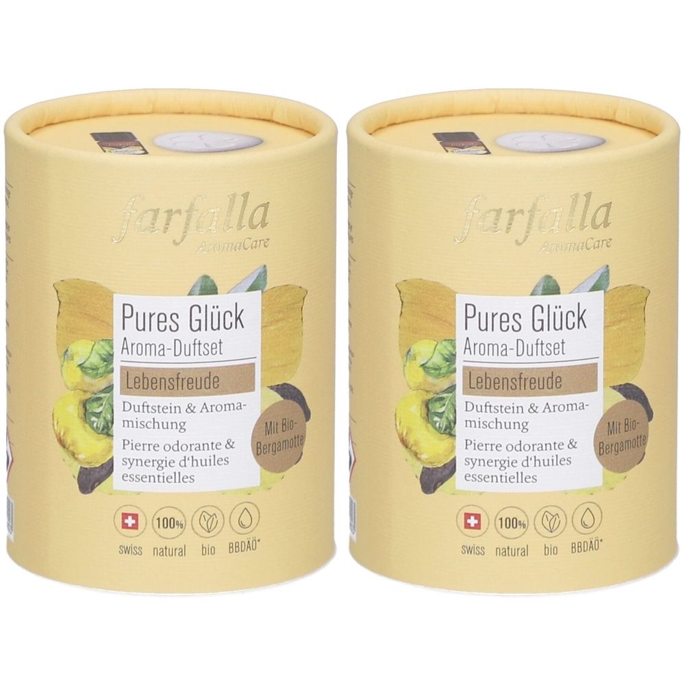 Twee cilindrische containers met opschrift "Farfalla Pures Glück Aroma-Duftset Lebensfreude". Swiss Natural Bio-certificering.