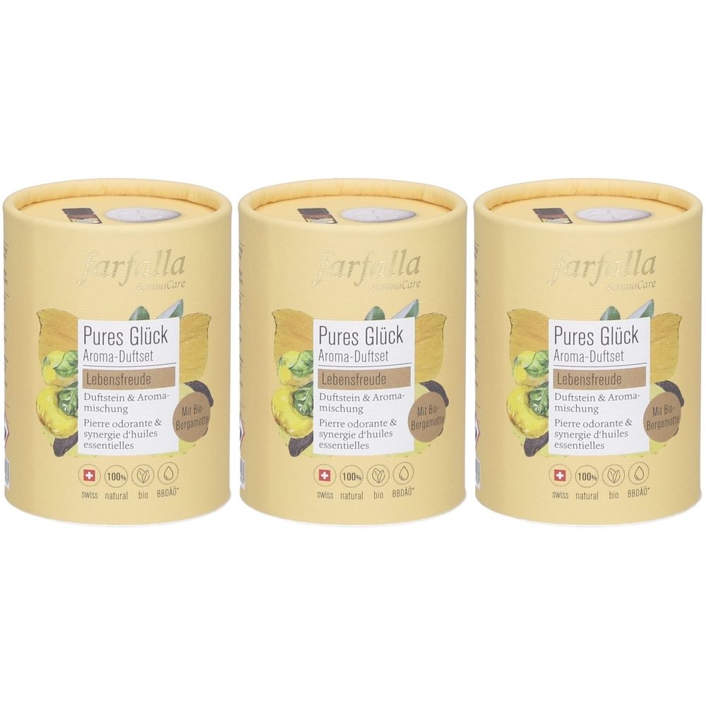 Drie cilindrische containers. Opschrift: Pures Glück Aroma-Duftset Lebensfreude. Met Zwitsers kruis en 100% Natural.