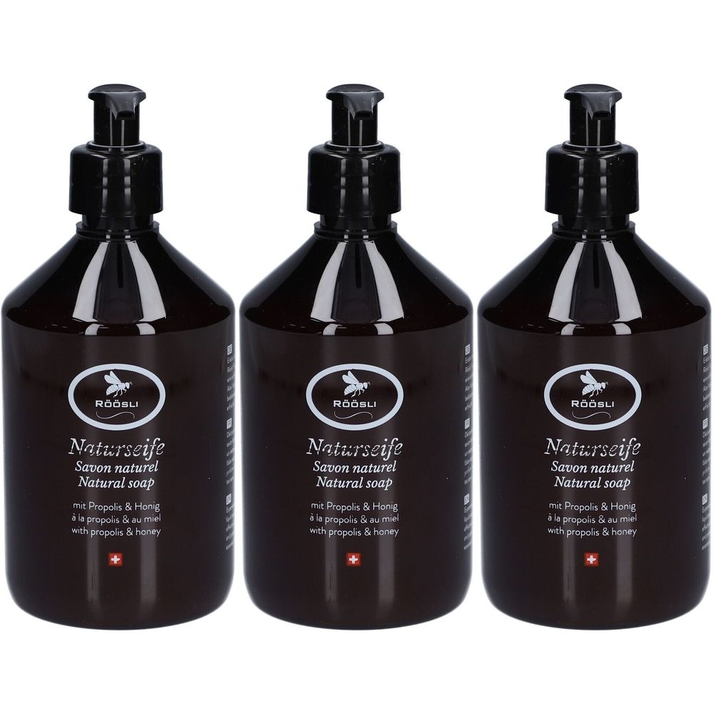 Trois flacons de savon brun avec pompe noire. Chaque flacon porte l'inscription "RÖÖSLI Naturseife" et "mit Propolis & Honig".
